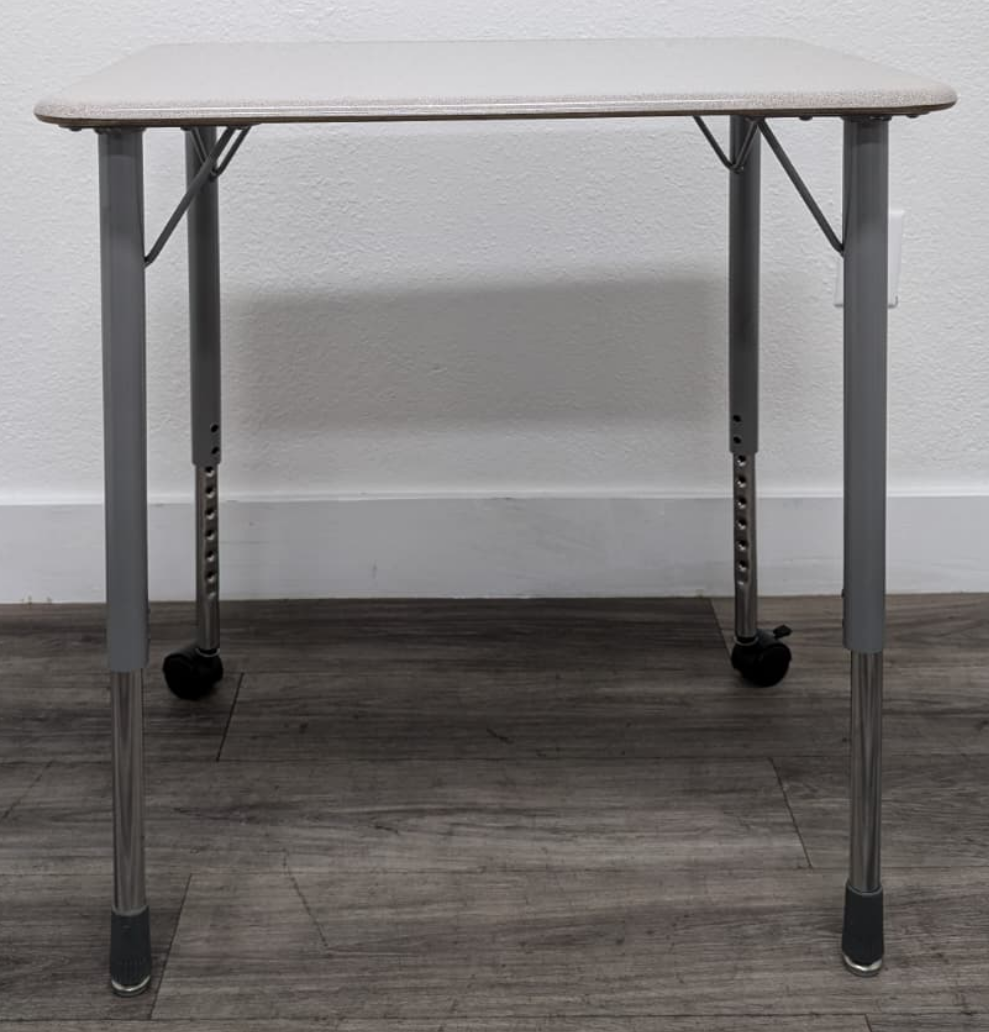office worker NewHeights Split Work Surface Electric Sit to Stand Desk